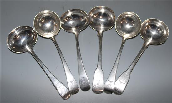 Two pairs of George III silver Old English pattern sauce ladles and a pair of similar fiddle pattern sauce ladles, 10.5 oz.